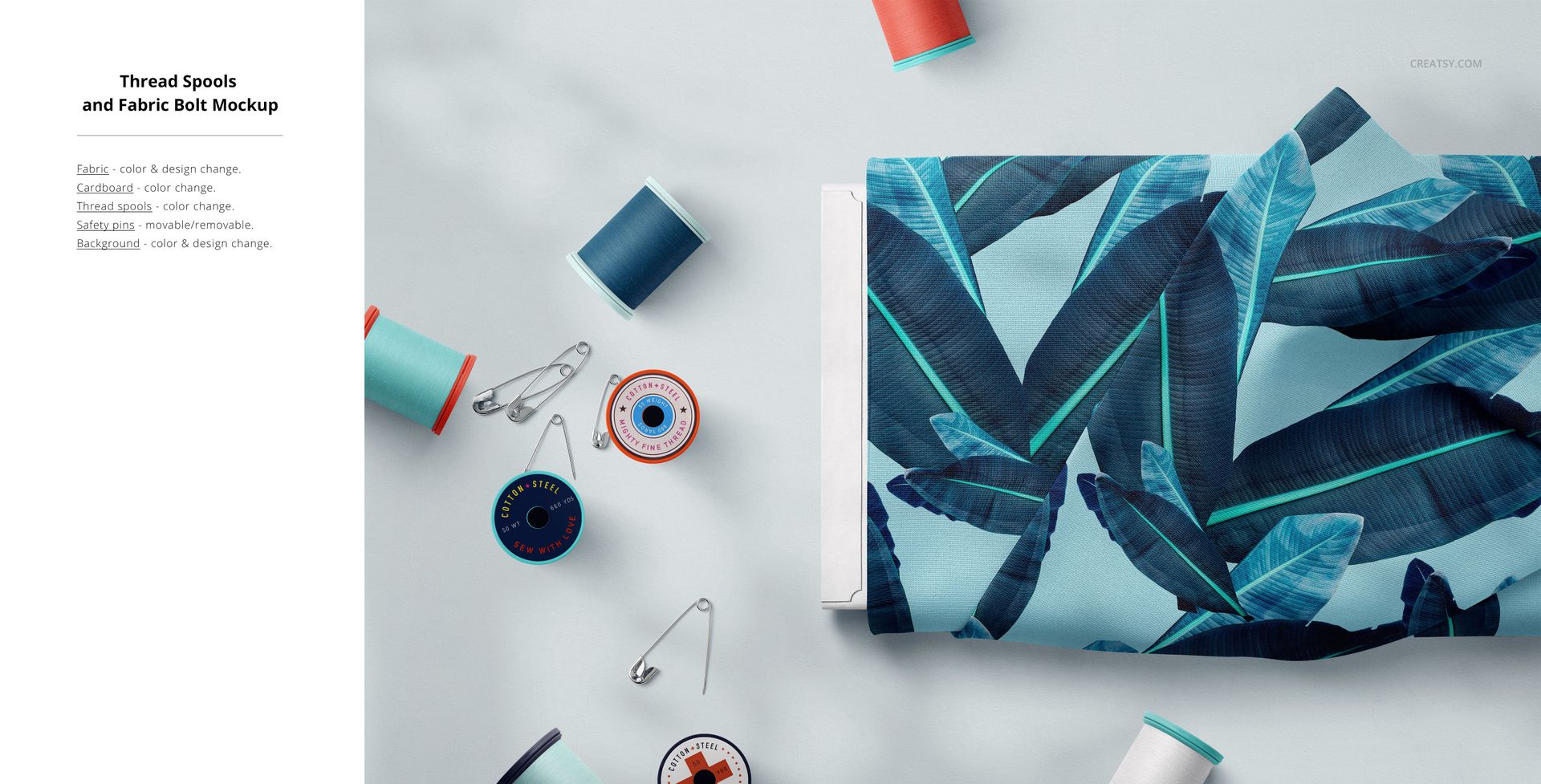 PSD mockup showing a fabric bolt with tropical leaf design, placed next to assorted thread spools and sewing accessories.