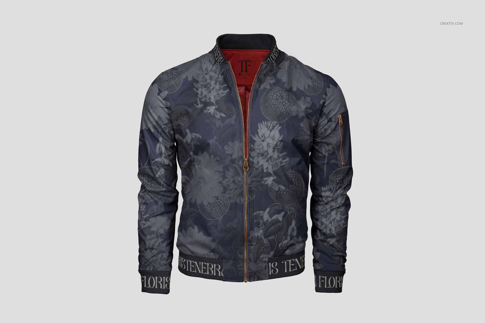 Men's bomber jacket mockup in dark blue with subtle floral pattern, front view, gold zipper, and ribbed cuffs.