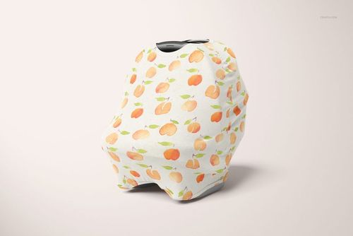 PSD mockup of a multi-use cover featuring orange peach illustrations, displayed on a car seat with a light backdrop.