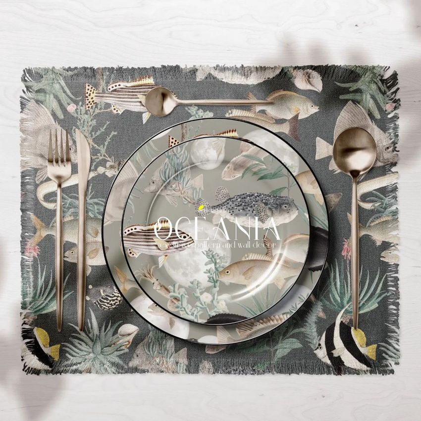 Fringed placemat and plates mockup showing a top view of a table setting with ocean-themed patterns and metallic cutlery.