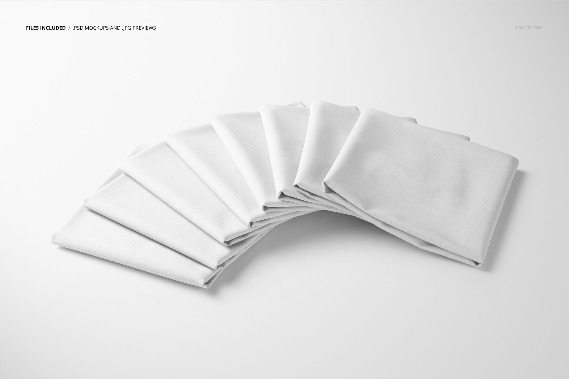Set of multiple folded textile samples spread out in a semi-circle, presented in a PSD mockup format.