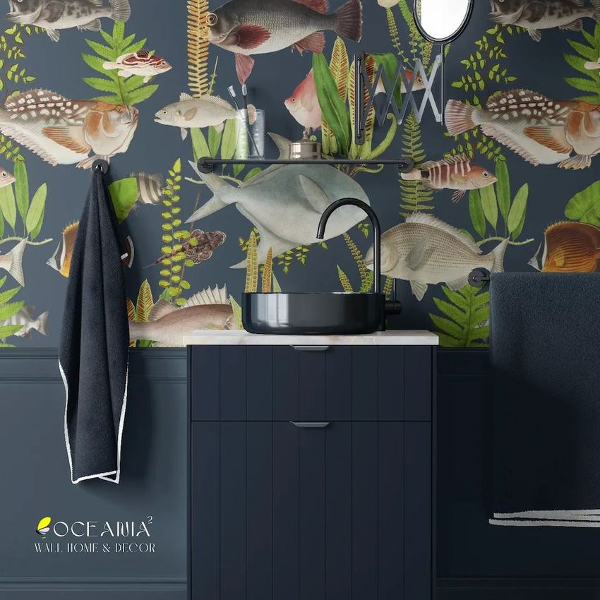 Bathroom wallpaper mockup featuring a dark vanity with a round black sink, fish and plant pattern wallpaper, and a towel hanging on the wall.