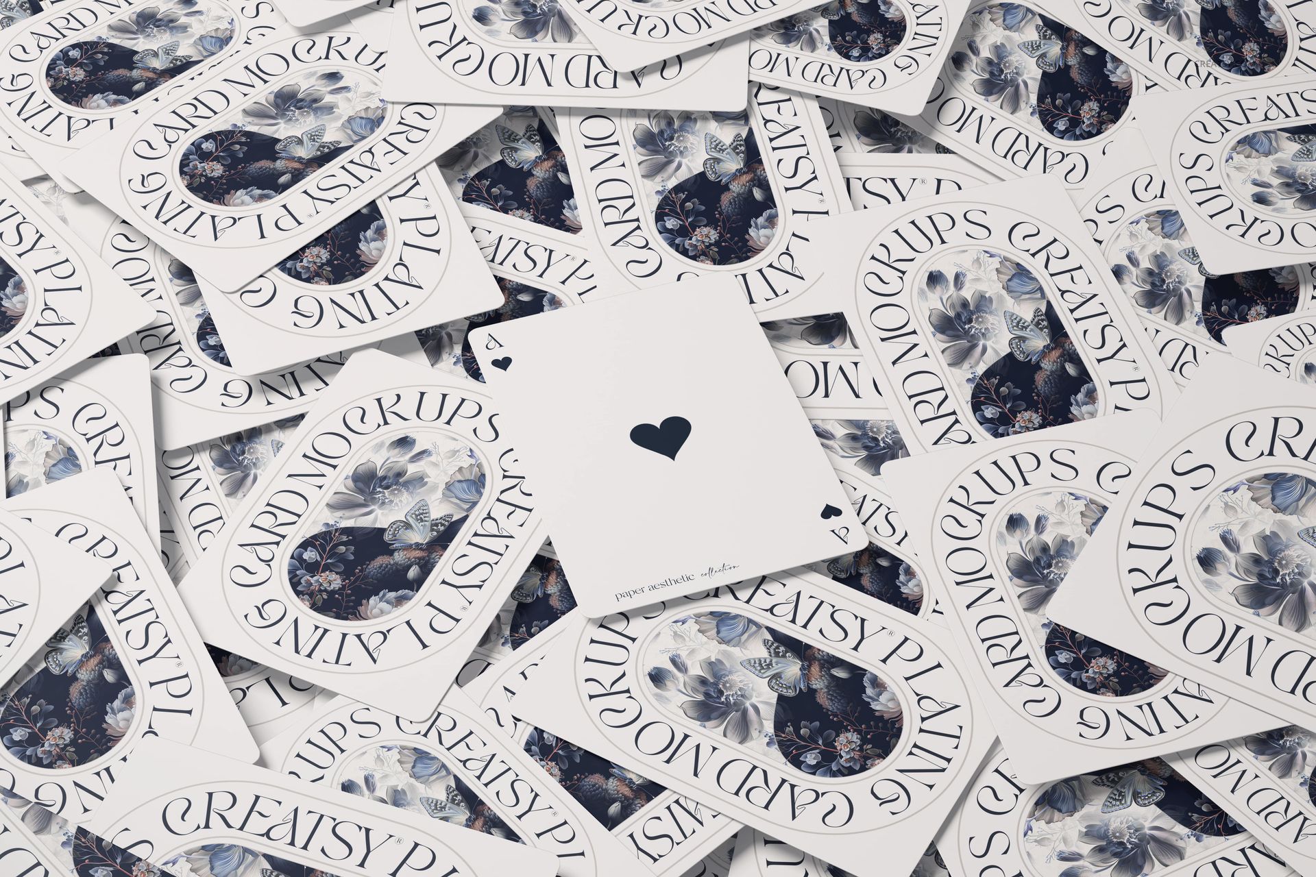 PSD mockup showing an arrangement of playing cards with floral designs on the backs and a front-facing ace of spades.