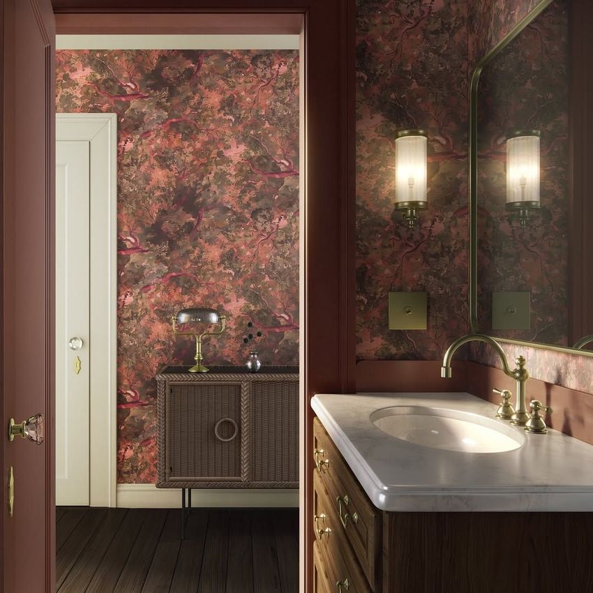 Modern art deco bathroom mockup featuring a marble sink, brass fixtures, and floral-patterned wallpaper in warm tones.