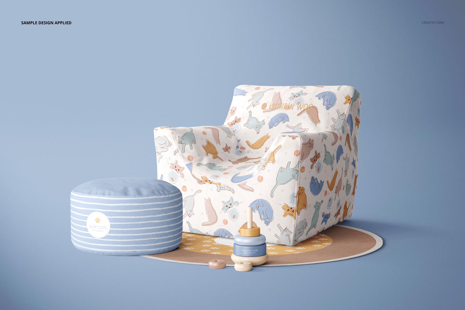 PSD mockup of a kids bean bag chair featuring colorful animal illustrations, paired with a blue striped ottoman and toys.