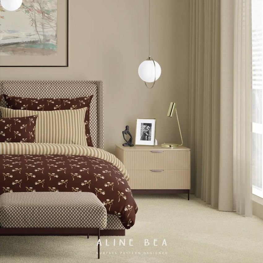 Bedroom scene bedding mockup showing a neatly made bed with brown and beige patterned linens, a bench, and a nightstand with decor.