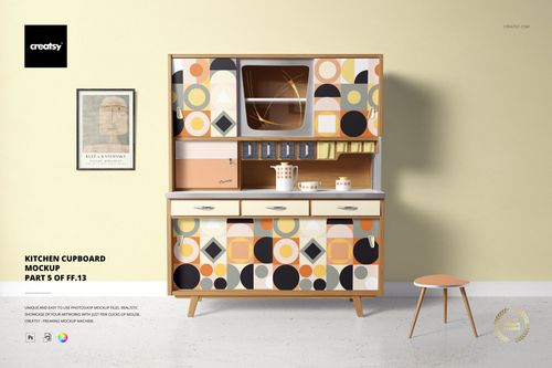Front view of a kitchen cupboard mockup with geometric patterned doors in orange, black, beige, and yellow tones against a light wall.