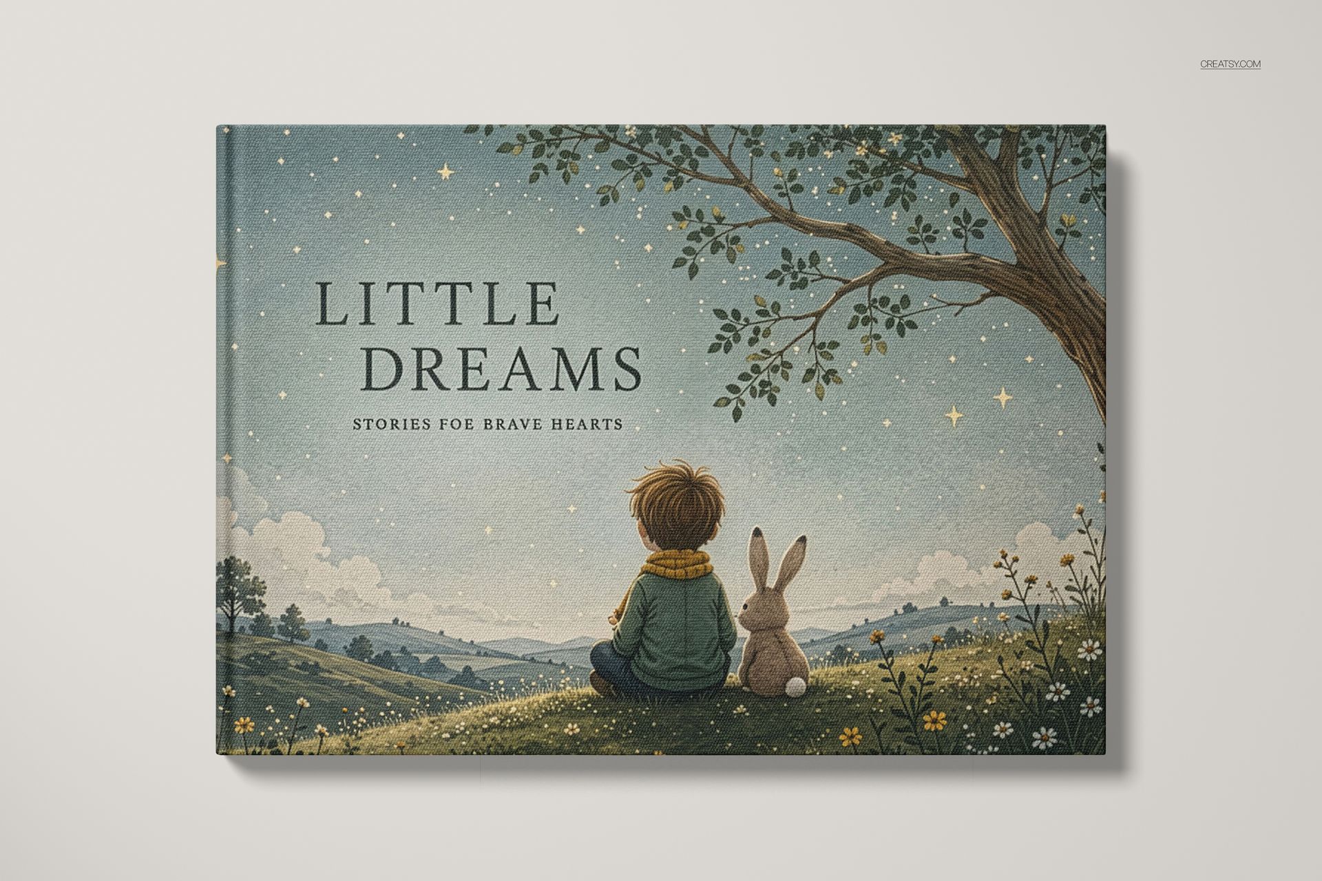 A4 landscape book mockup showing a front cover with a child and rabbit sitting under a tree at night, stars visible.