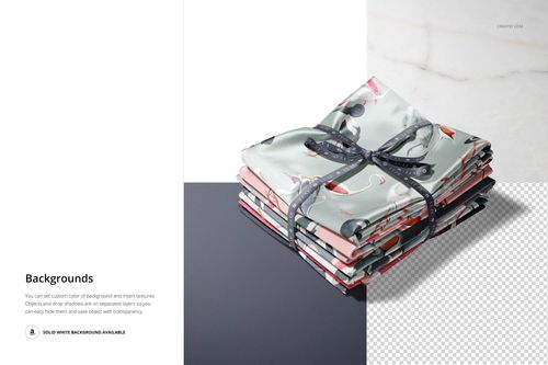Satin fabric stack mockup featuring multiple folded pieces with various designs, displayed on marble and solid surfaces.