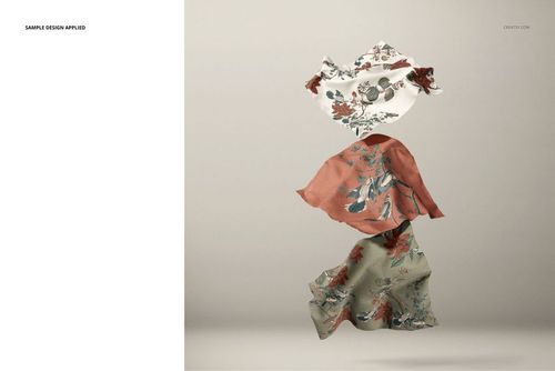 Stacked floating fabrics featuring floral designs in white, rust, and green colors, displayed in a PSD mockup scene.