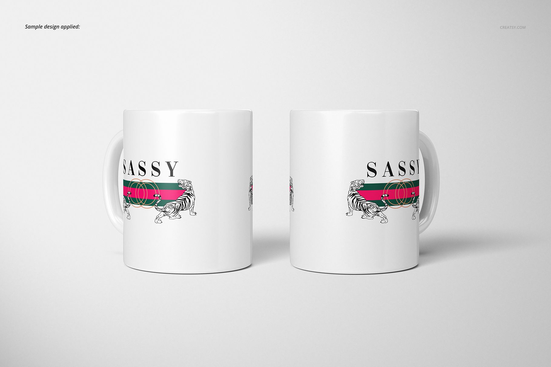 Two white 11oz mugs with a sassy tiger and stripe graphic, shown side by side on a plain light background, front view.
