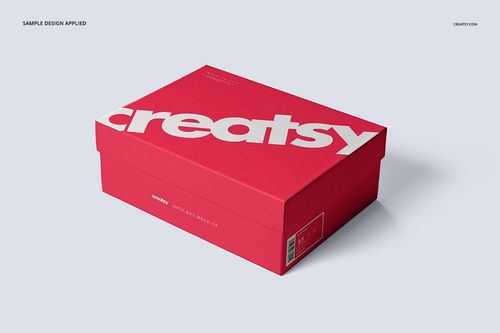 Red shoe box mockup with prominent white lettering, viewed from a slight angle, placed on a neutral light surface.