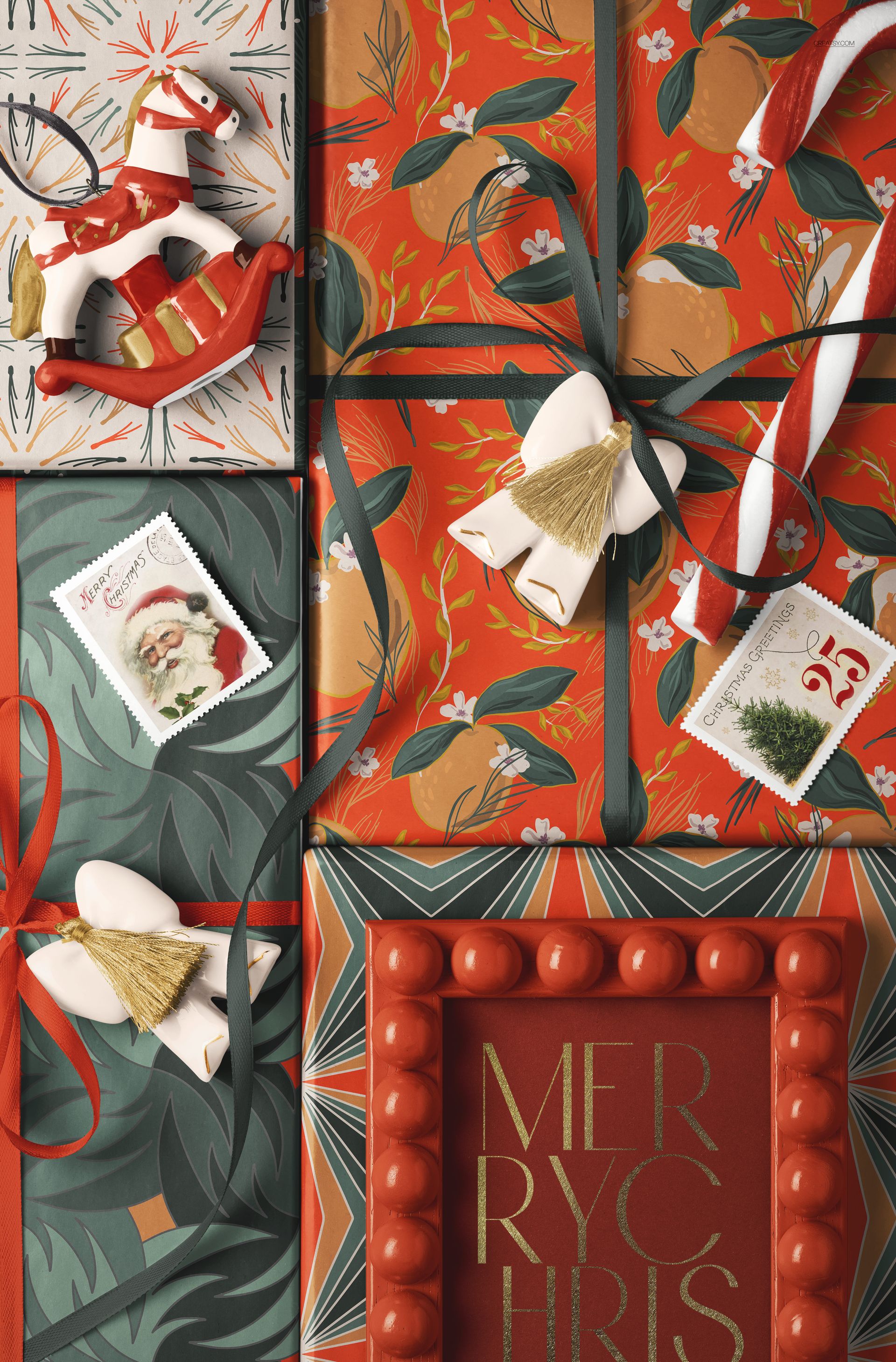 Christmas wrapped gift boxes with colorful ribbons and festive patterns, viewed from above with holiday props.