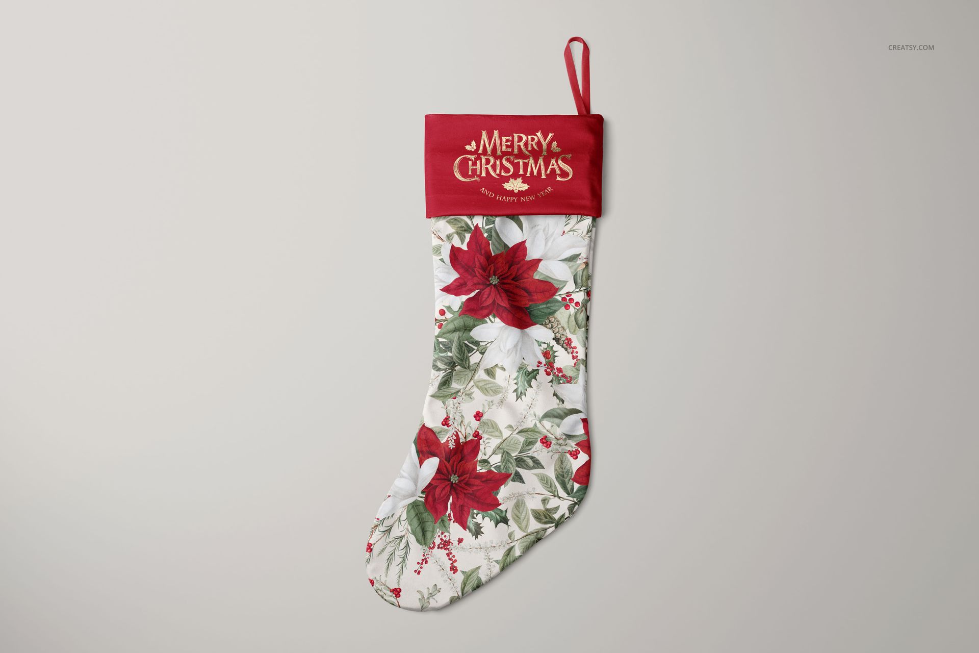 Festive stocking mockup with red top, white body decorated with red and white poinsettias, front view on plain background.