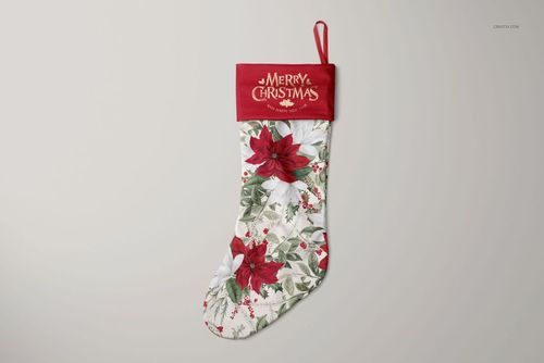 Festive stocking mockup with red top, white body decorated with red and white poinsettias, front view on plain background.