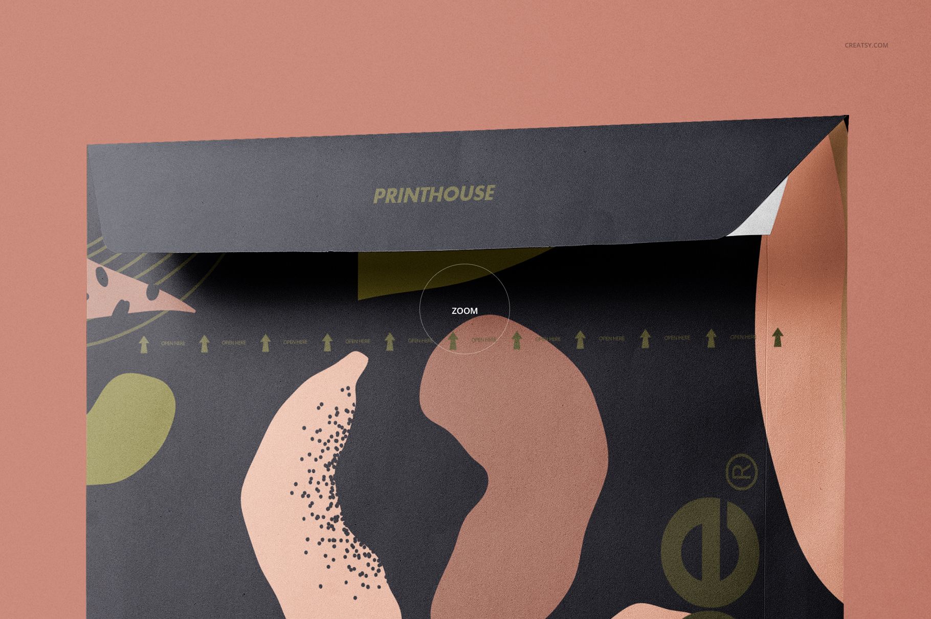 Front view of a large envelope mockup with abstract peach and black patterns, set against a muted pink background.