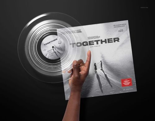 Clear vinyl record mockup with hand holding the record and cover, featuring minimalist black and white design elements.