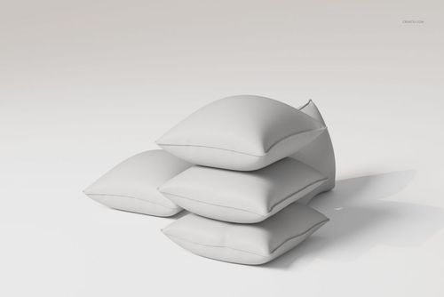 Four white piped cushions stacked in a staggered arrangement on a plain light background, viewed from the side.