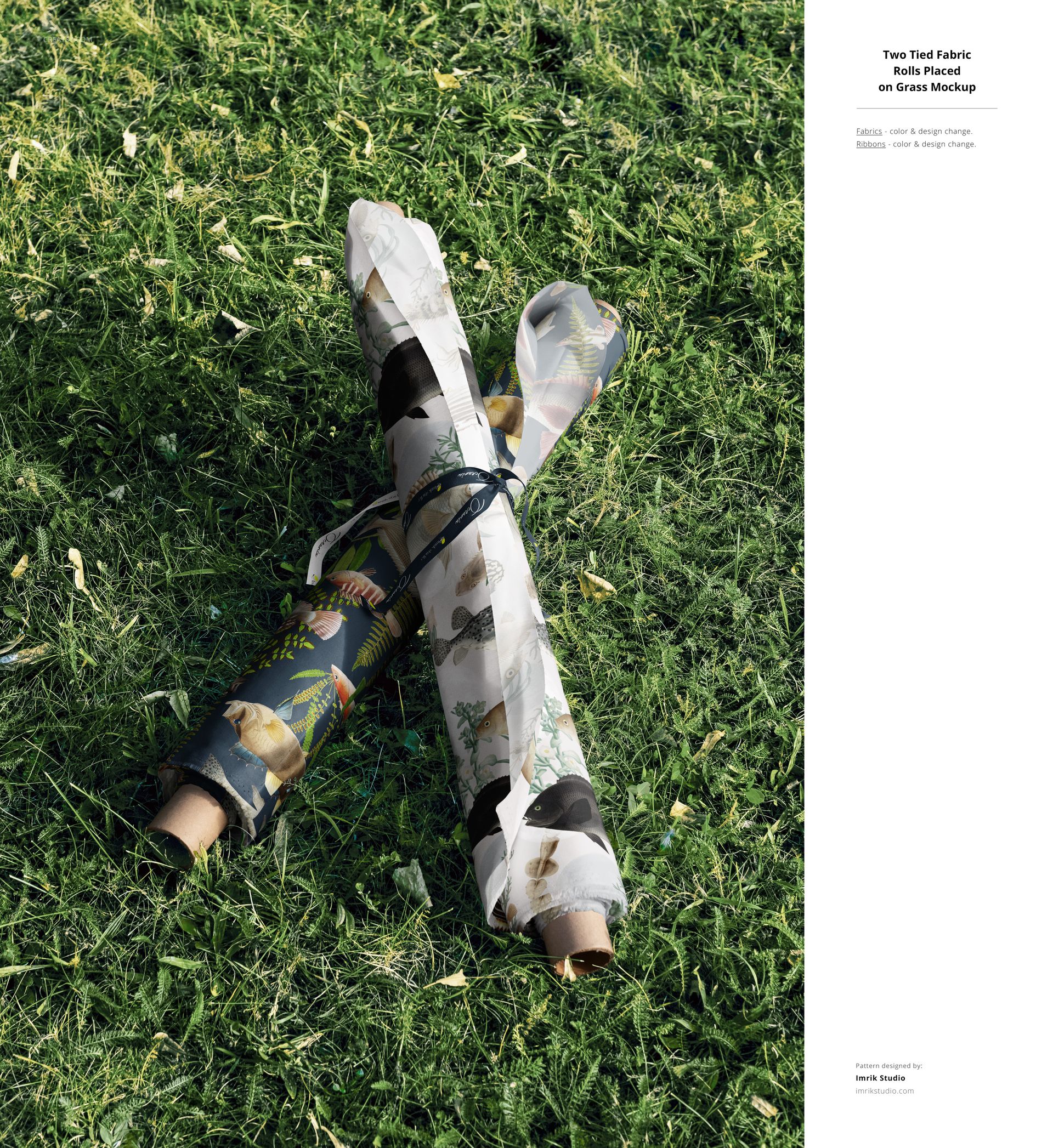 Outdoor scene showing two patterned fabric rolls tied with string, lying on a grassy surface, PSD mockup style.