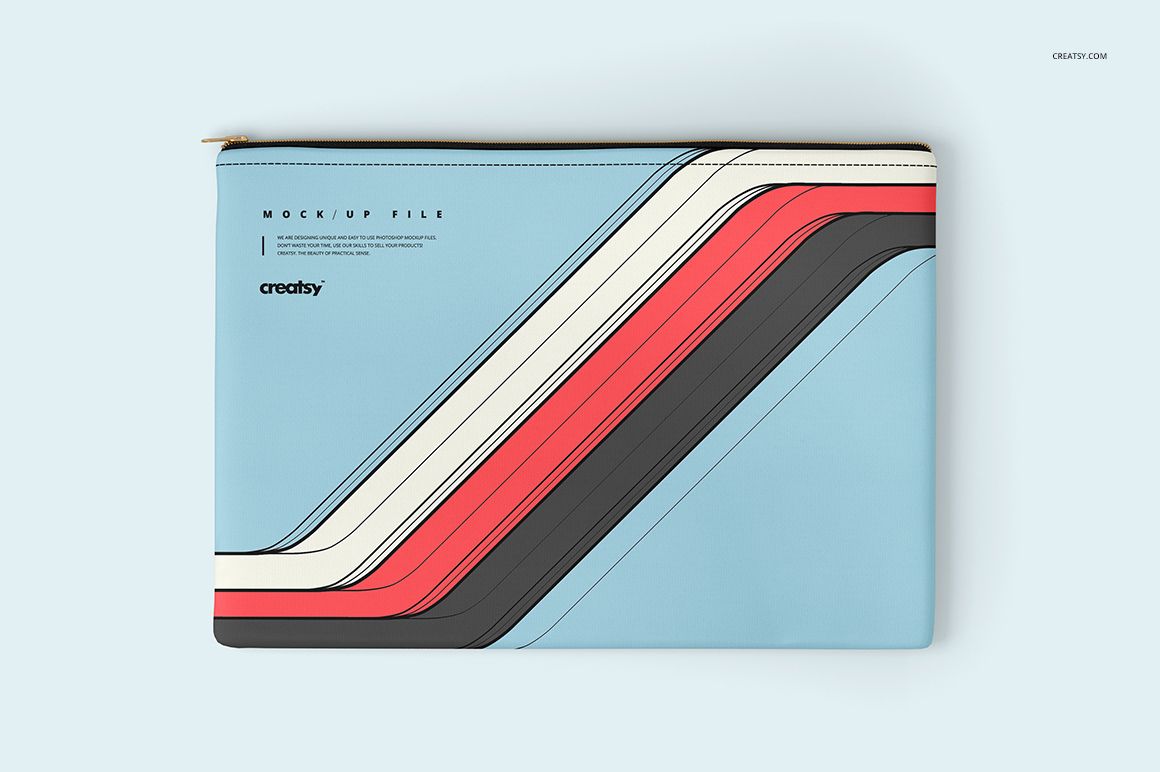 Accessories pouch mockup with a geometric stripe pattern in red, black, and white on a pale blue surface, shown from above.