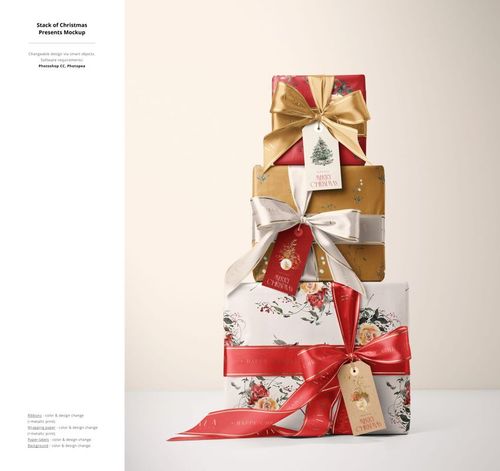 Front view of Christmas decor mockup showing assorted wrapped gifts with decorative ribbons and seasonal labels.