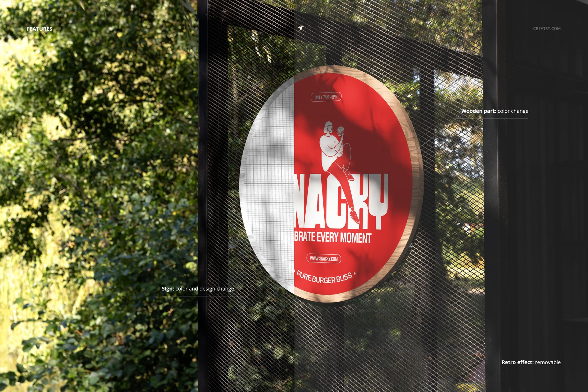 PSD mockup of a circular signboard featuring bold red and white colors, displayed on a black mesh structure outdoors.