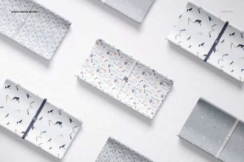 Flat lay of several changing pad mockups featuring different playful prints and neutral color schemes.