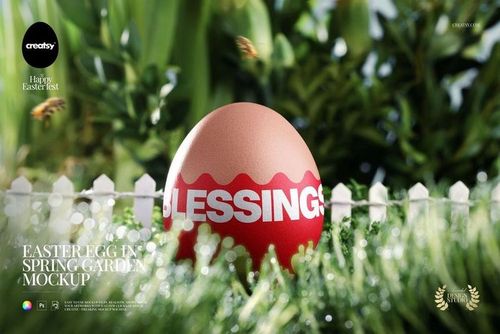 PSD mockup showing a single Easter egg in a vibrant garden setting, featuring greenery and a small white fence.