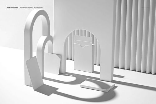 Minimalist PSD mockup with blank playing cards, a standing tuck box, arches, and folded paper backdrop on a clean surface.