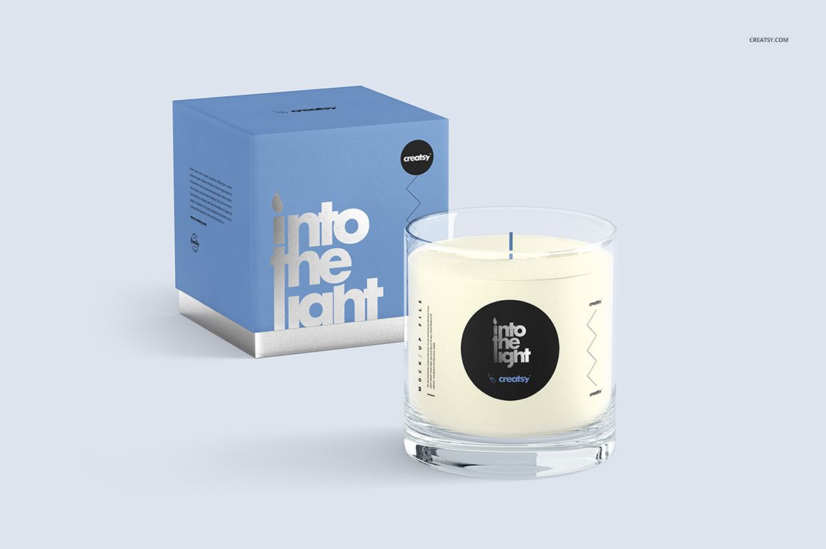 Ultimate Scented Candle mockup featuring a glass candle jar and blue box, displayed on a neutral surface.
