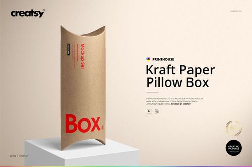 Front view of a kraft paper pillow box mockup standing upright on a light background, featuring red text and minimal props.