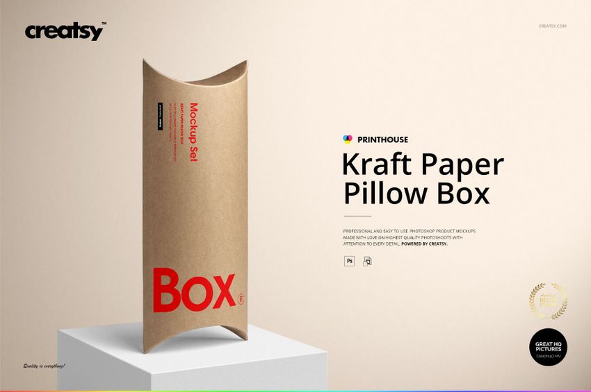 Front view of a kraft paper pillow box mockup standing upright on a light background, featuring red text and minimal props.