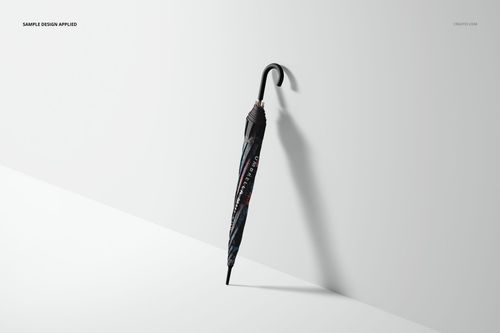 Umbrella mockup set showing a folded umbrella with black and gray pattern, positioned upright on a white surface.