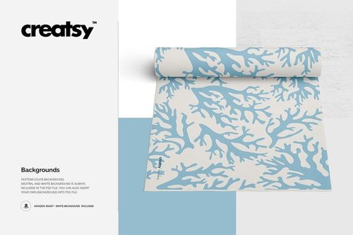 Flat woven rug mockup featuring a blue and white coral design, displayed with one edge rolled up, front perspective.