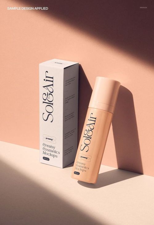 Airless bottle and rectangular packaging box in soft peach tones, shown in a cosmetics PSD mockup scene.