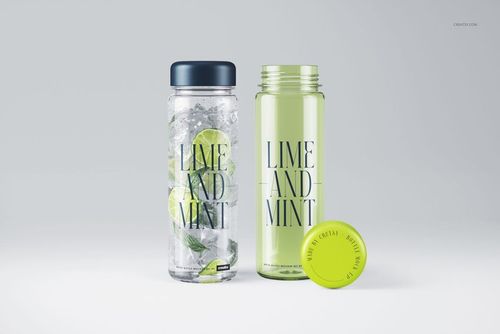 Clear water bottle PSD mockup set showing two bottles, one with lime and mint, and a lid placed beside them on a plain surface.