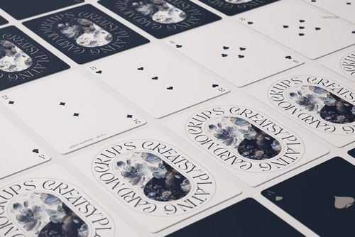 Close-up view of playing cards mockup featuring detailed card backs and faces with minimalist spade and club symbols.