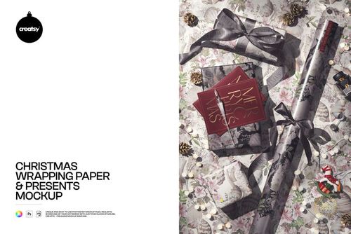 Top view of Christmas wrapping paper mockup with gray floral pattern, gift boxes, pinecones, and festive decorations.