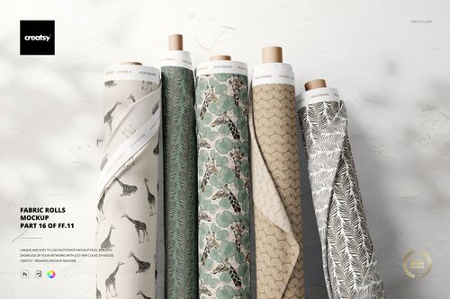 Upright fabric rolls with assorted animal and geometric designs in beige, green, and gray, shown in a PSD mockup scene.