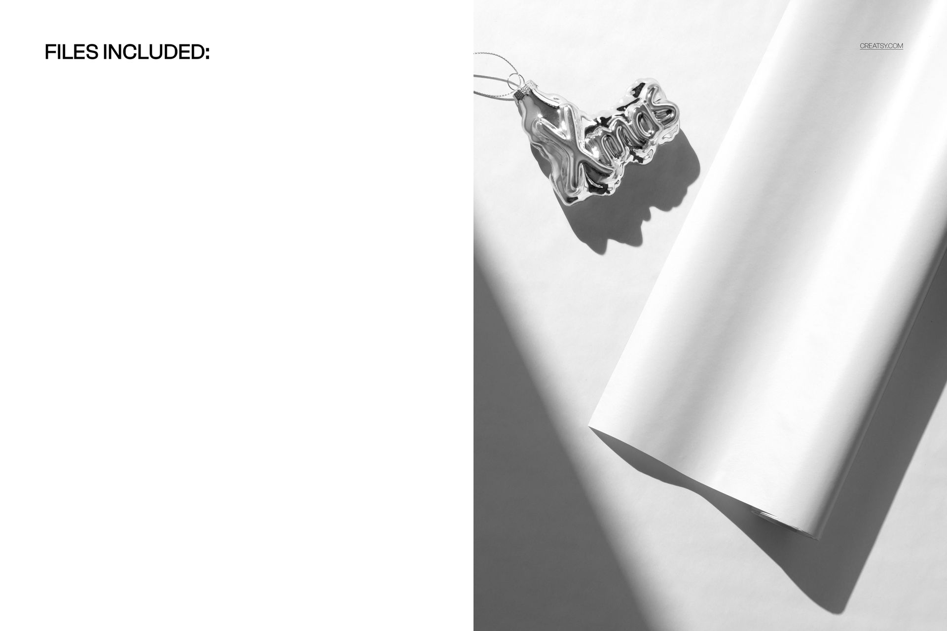 Minimalist scene featuring a plain wrapping paper mockup and a reflective silver Christmas ornament on a white surface.