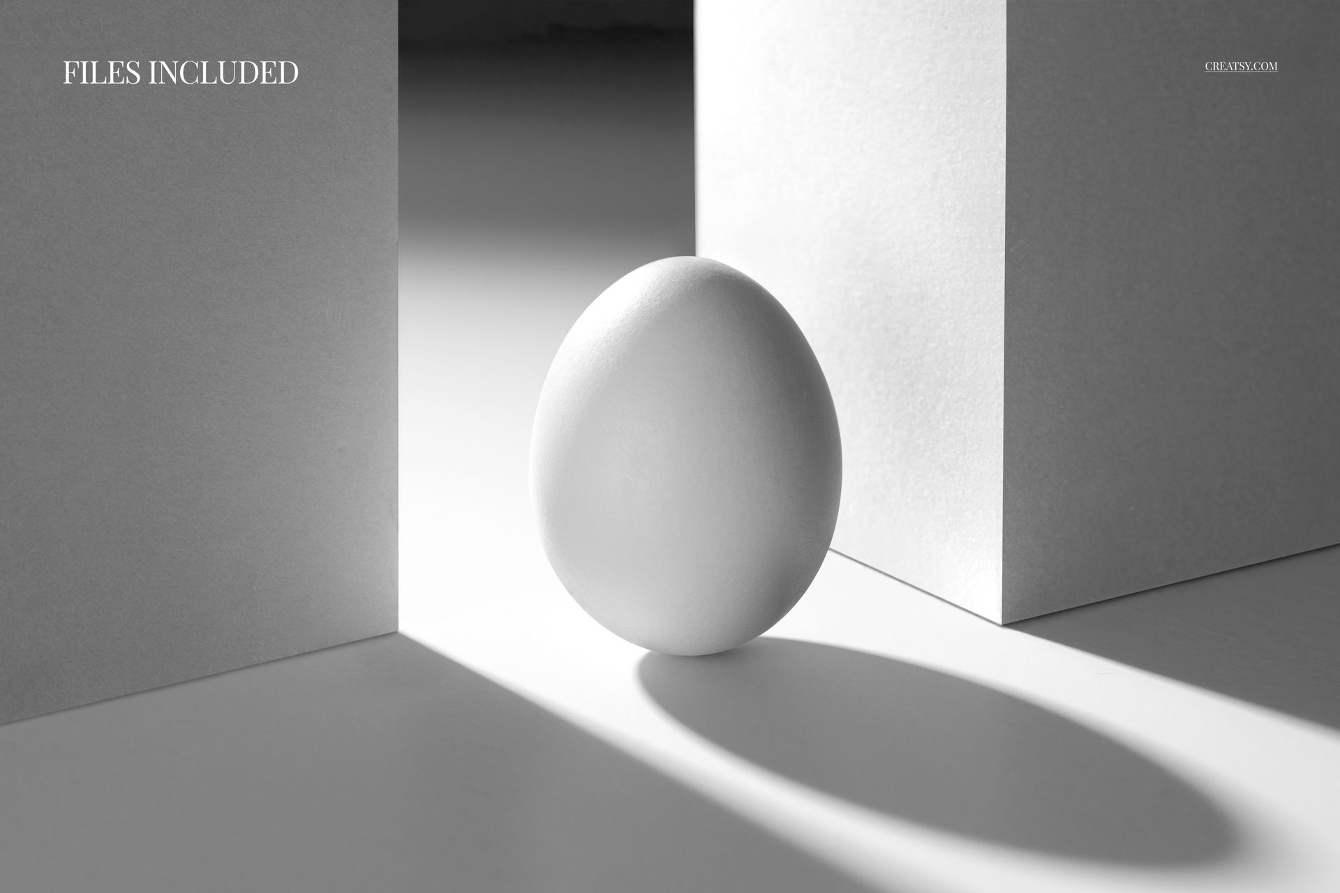 White Easter egg standing upright in a geometric studio mockup, surrounded by two rectangular white blocks, front view.