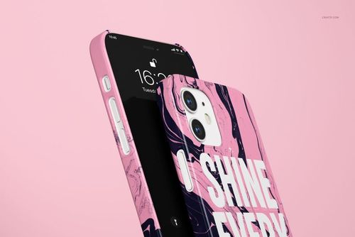Glossy iPhone 12 snap case mockup featuring a pink marbled pattern and bold white text, shown in close-up.