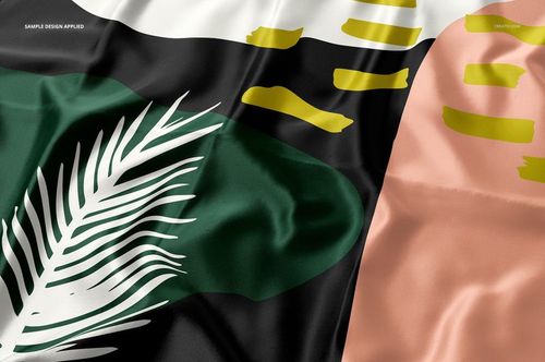 Silk fabric mockup with a laser cut finish, featuring abstract shapes in black, green, peach, and yellow colors.