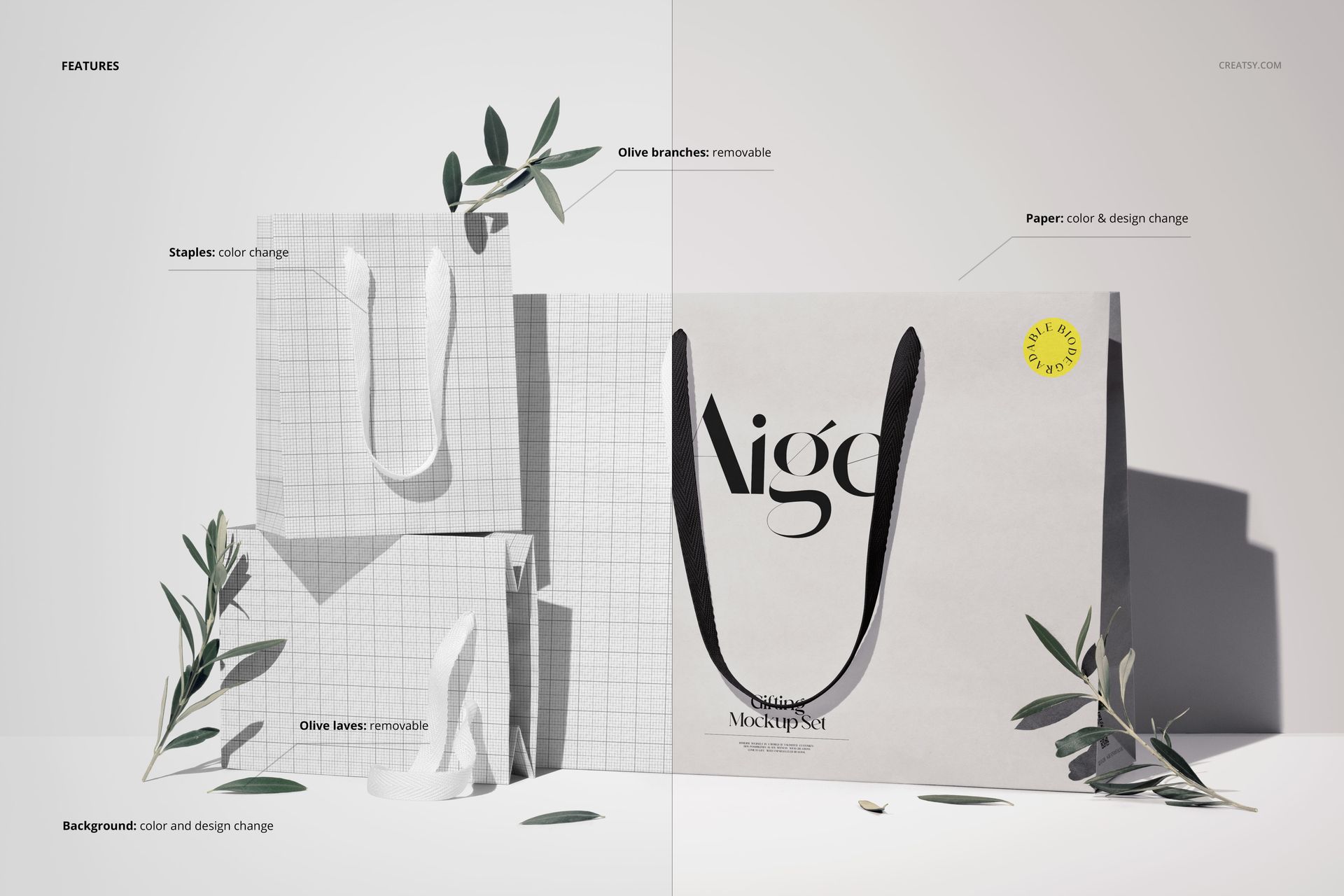 Paper gift bag mockup with cotton ribbon handles, olive leaves, and customizable background in a minimalist scene.
