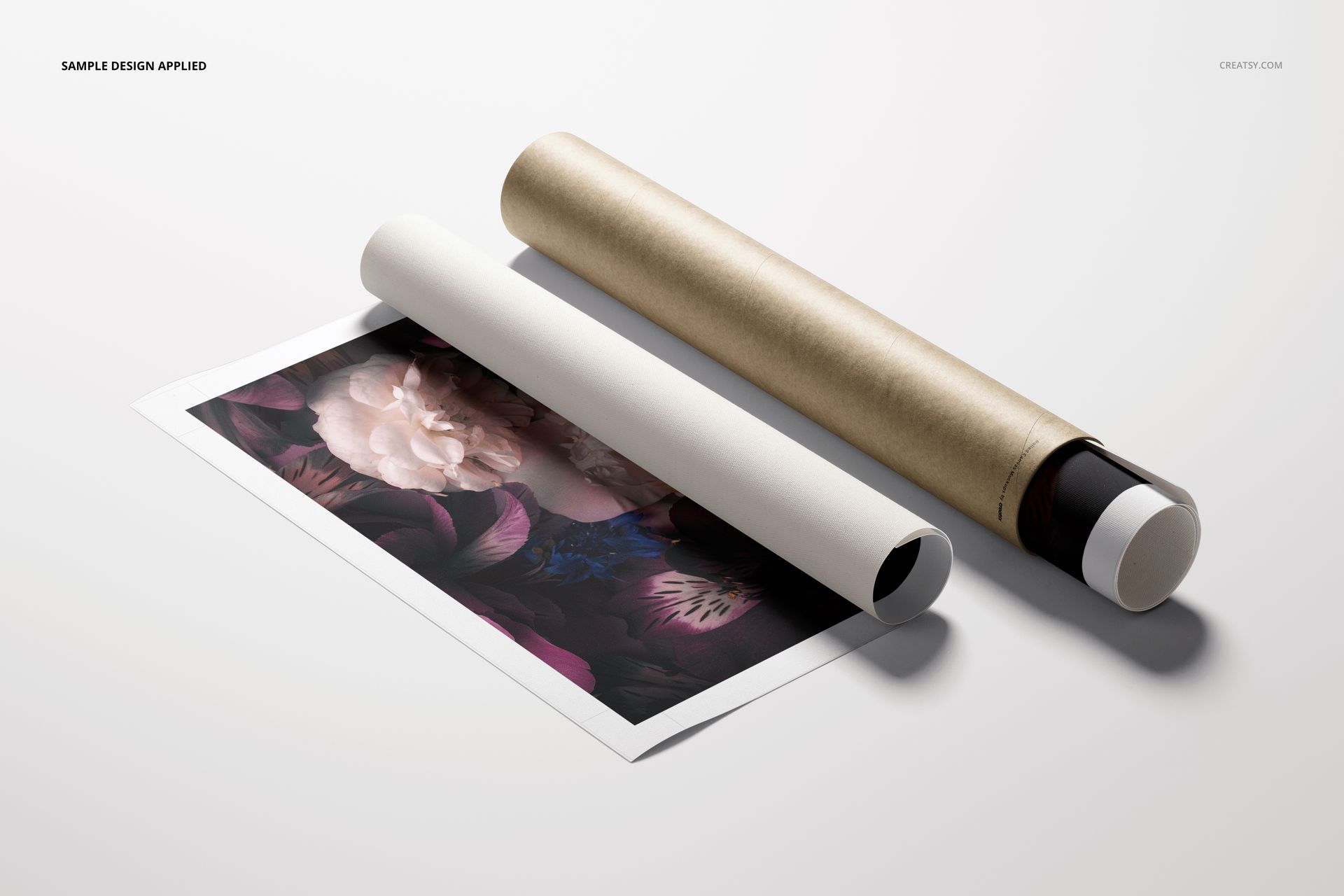 Square canvas print mockup showing a floral design beside a cylindrical shipping tube on a white background.