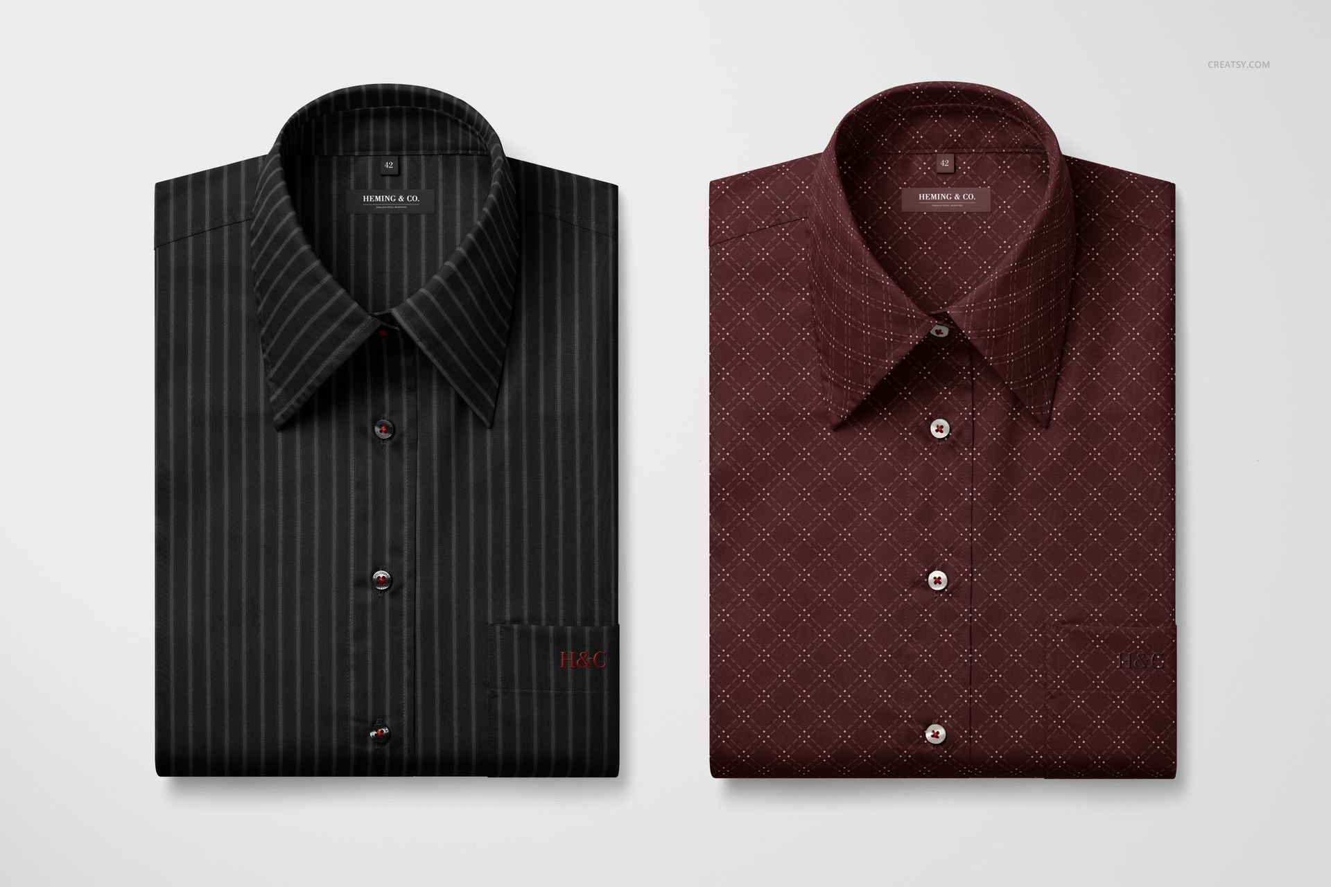 PSD mockup of two folded point-collar shirts, one black striped and one maroon patterned, arranged on a light background, top perspective.