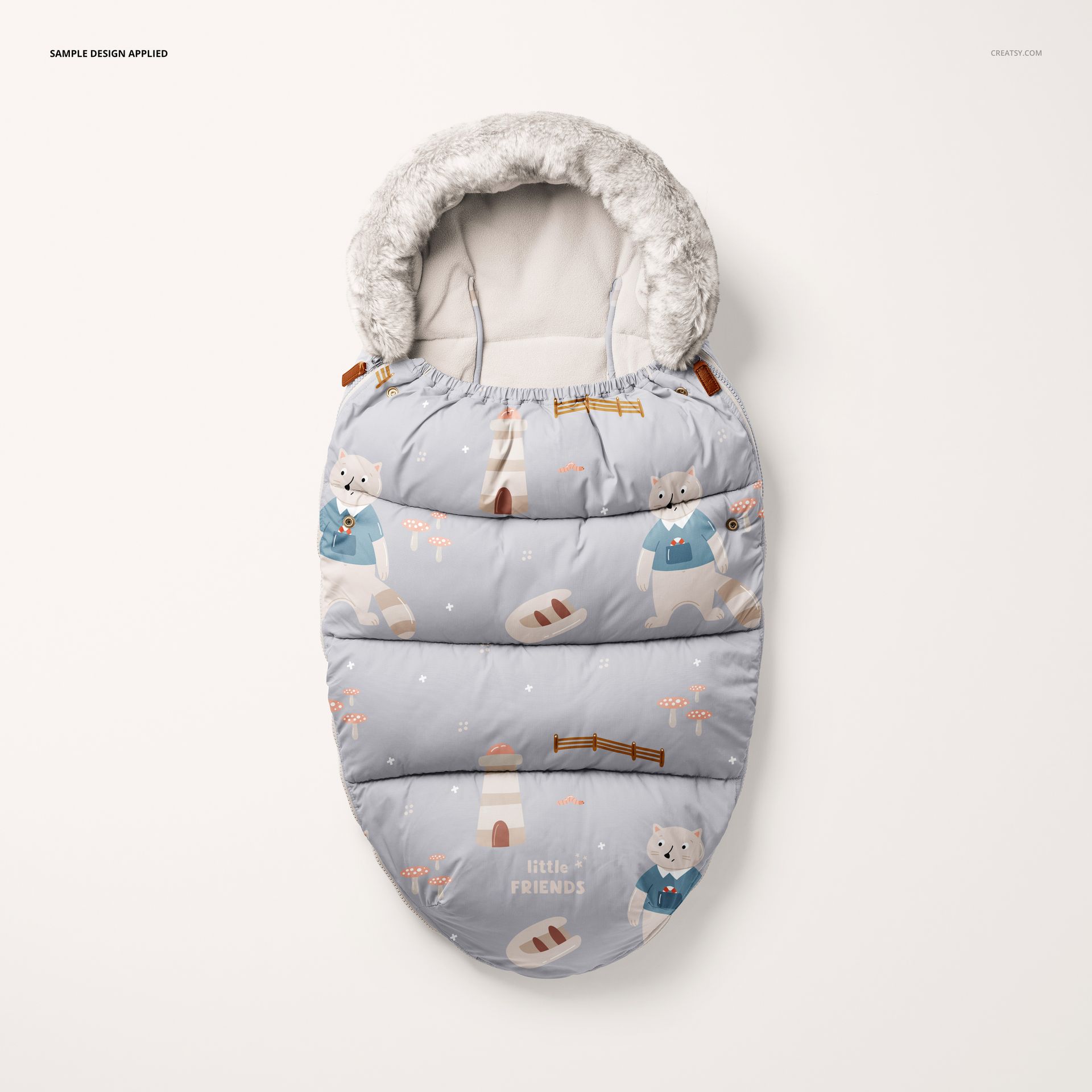 Children’s footmuff mockup in a neutral setting, displaying playful animal graphics and a plush hood detail.