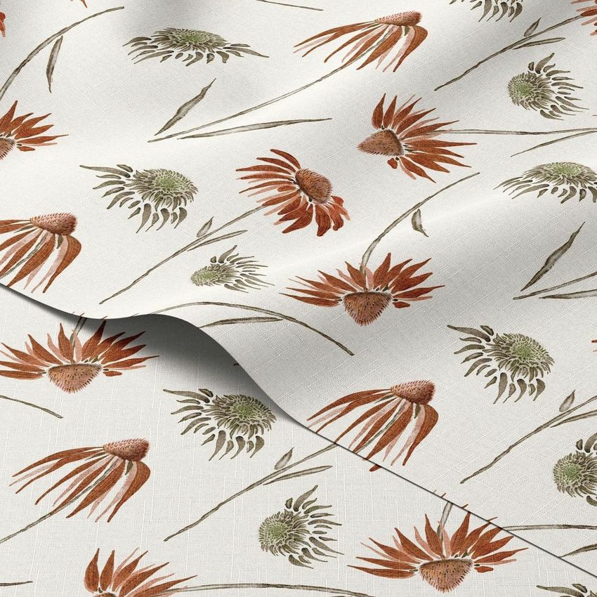 Fabric mockup showing two overlapping layers of textile with a rust and pink echinacea floral pattern on a light background.