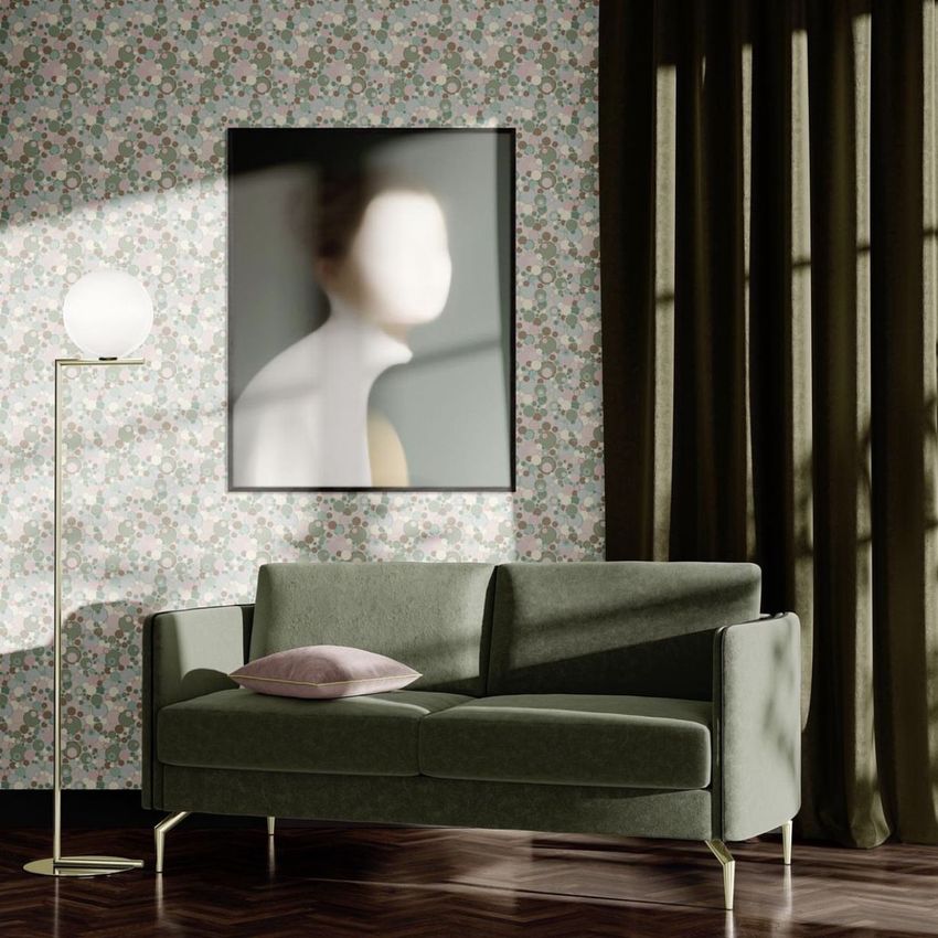 Modern classic living room scene mockup with a green velvet sofa, pink pillow, floral wallpaper, and a floor lamp beside a framed abstract art piece.