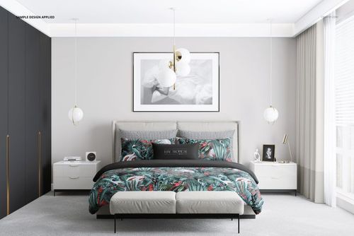 Bedroom scene PSD mockup with a double bed dressed in green and red leaf-patterned bedding, flanked by nightstands.